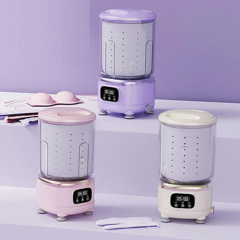 Game Changing Portable Mini Washing Machine Cordless Compact Laundry Spin Dryer Travel Ready in pink and purple colors.