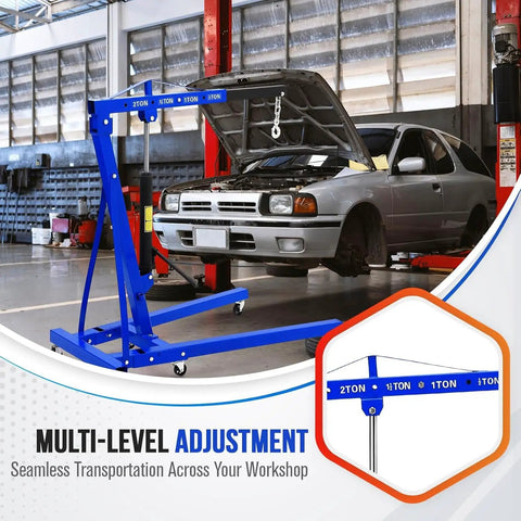 Heavy Duty Hydraulic Engine Hoist 2 Ton Folding Cherry Picker Delivers 4400 Lbs lifting engine in a garage with multi-level adjustment.
