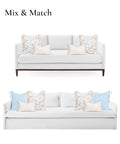 Coastal Lumbar Pillow Cover 12x20 Inches, Water-Repellent Indoor Outdoor shown on couch with decorative pillows, scalloped edge