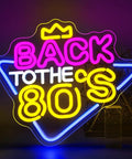 Multicolored 'Back to the 80s' neon sign with crown design, featuring vivid pink, yellow, and blue LED lights.