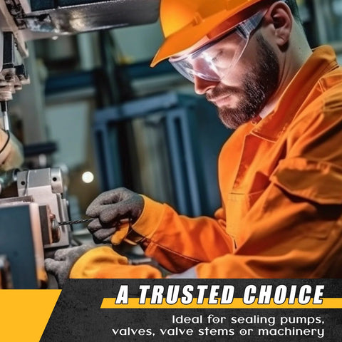 Braided graphite valve packing being installed by a worker in orange safety gear