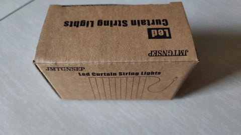 Box packaging of Multicolor USB Curtain Lights With Eight Modes For Indoor And Outdoor Decor, brand printed on top.