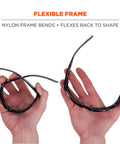 Skullerz Odin Safety Glasses Matte Black With Anti Fog Smoke Lens shown with flexible nylon frame in hands