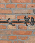 Vintage Cast Iron Tree Branch Coat Hook For Walls And Entryways Bringing Dope Rustic Vibes And Straightforward Storage Solutions That Honestly Upgrade Your Home Decor Setup on brick wall