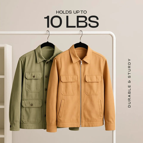Two jackets on black velvet hangers with pants bar and 360-degree swivel hook, holds up to 10 lbs, against white background.