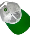 Interior view of adjustable golf hat for men and women, performance polyester cap, white and green, breathable comfort