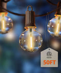Close-up of Lit 50 Foot Outdoor LED String Lights With 27 Plastic G40 Bulbs And 2 Spare, glowing warm white, outdoors