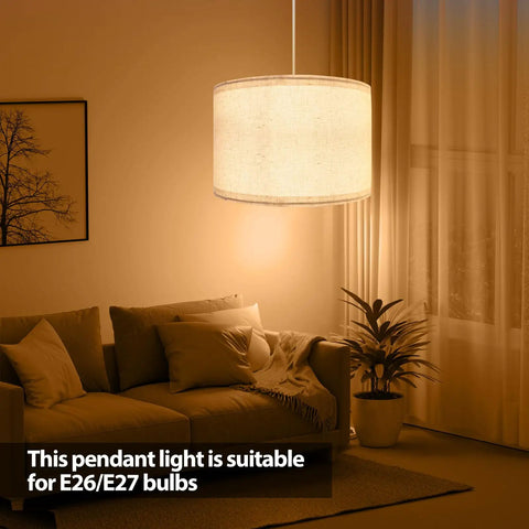 Plug In Pendant Light With 15 Foot Hanging Cord And Toggle Switch Natural Linen Drum Shade E26 Bulb Socket Modern Beige Fixture in cozy living room setting.