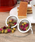 Open Two Pack 2.1 Inch Stainless Steel Mesh Tea Ball Infuser Strainer Filters For Teas Durable 304 Grade Tea Filter Basket filled with tea leaves