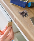 Double Roller Cabinet Door Catch Set Of 12 With Soft Cushion Spring Loaded Ball Latches for cabinets on a wooden countertop