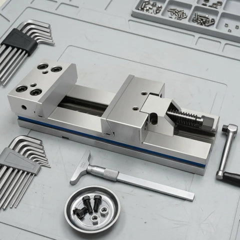 Heavy-Duty Combination Flat Vise Machine Precision Milling Tool on workbench with tools and fasteners.