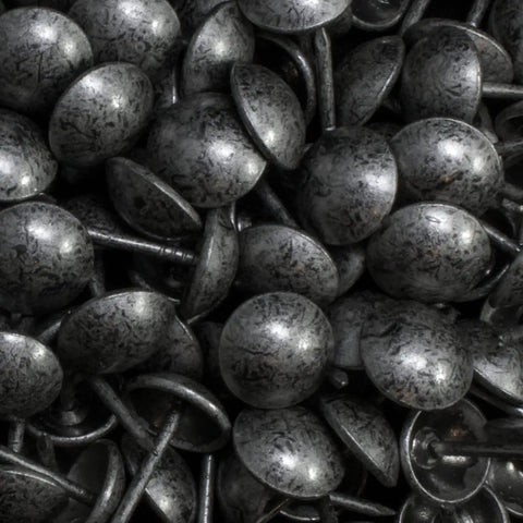 Heavy Duty Upholstery Tacks With A Sweet Antique Pewter Finish For Top Shelf Diy Furniture Fixes And Solid Home Project Upgrades Boasting Badass Durability With 100 Pieces Included close-up of antique pewter tacks