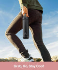 Person holding 26 Oz Stainless Steel Insulated Water Bottle With 2 In 1 Straw And Spout Lid Keeps Drinks Ice Cold All Day Leak Proof