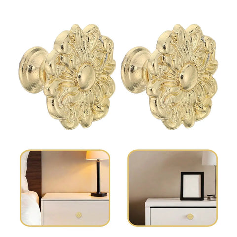 Antique Zinc Alloy Drawer Pulls for Dresser and Cabinets with gold floral design, shown on white furniture drawers.