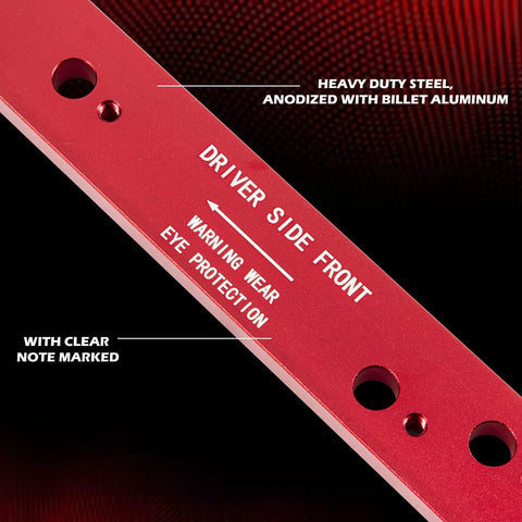 Red anodized steel manifold drill template for GM LS engines (1999–2007) to remove broken exhaust bolts; driver side front.