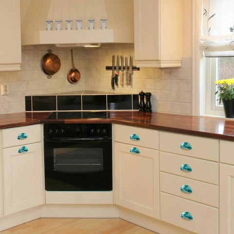 Premium Teal Marble Cabinet Cup Pulls mounted on kitchen drawers with a sleek stone aesthetic and practical 2.6 inch hole centers.