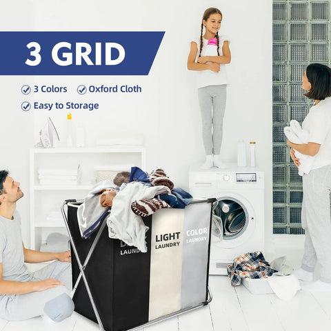 Family in a laundry room with a Foldable 3 Section Laundry Hamper With Stainless Steel Frame Freestanding Game Changing Laundry Bin Organizer For Bathroom Or Bedroom Waterproof Collapsible Clothes Storage Basket With Handles 3 Liner Set In White Grey Black.