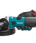 Person holding Heavy Duty 6 Inch Cut Off And Angle Grinder With 13 Amp Motor Variable Speed 4000 To 10000 RPM SJS System