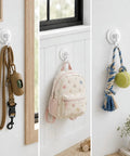 Heavy Duty Adhesive Swivel Hooks Four Pack No Drill Rotating Wall Mounts for hanging leashes, bags, and toys.