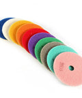 Colorful abrasive pads from Pro Grade Polishing Pads Set For Wet And Dry Grinding, suitable for marble granite stone surfaces.