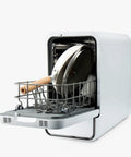 No Drama Portable Countertop Dishwasher With Dead Simple Fifteen Minute Wash Cycle Auto Dry Function Plumbing Free Setup Real Deal For Tiny Kitchens Dorm Rooms And Rv Road Trips with a pan in the rack.