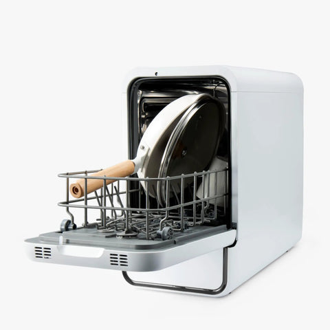 No Drama Portable Countertop Dishwasher With Dead Simple Fifteen Minute Wash Cycle Auto Dry Function Plumbing Free Setup Real Deal For Tiny Kitchens Dorm Rooms And Rv Road Trips with a pan in the rack.