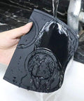 Espresso Tamper Mat For Home Barista Setup, Food Safe Silicone Coffee Tamp Pad With Anti Slip Surface being rinsed under water