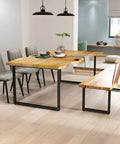 Heavy Duty Metal Table Legs 28 Inch High 35 Inch Wide Set Of 2 Built Tough As Nails To Handle 1200 Lbs Load Capacity Modern Industrial Desk Supports For Home Or Office in a dining setting with wooden top.