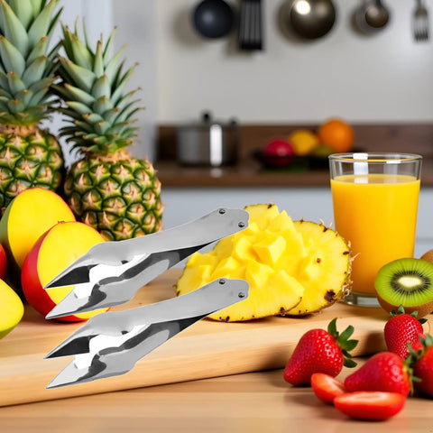Stainless Steel Pineapple Eye Remover And Core Cutter With V Shaped Tip, alongside fruits and juice on kitchen counter.