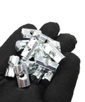 100 Piece M6 T Slot Slide Nuts For Aluminum Extrusion Framing Pro Grade Galvanized Steel Fasteners in hand, showcasing detail and size.