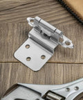 Heavy Duty Self Closing Flush Mount Cabinet Hinges 4 Pack With Quiet Close Iron Construction, shown on wooden surface with adjustable wrench