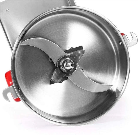Top view of Electric Grain Grinder Mill With Swing Open Chamber showing stainless steel blades for grinding grains and spices.