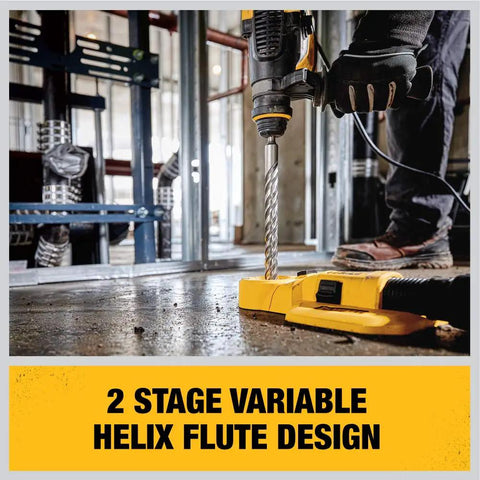 Rock Carbide SDS Plus Hammer Bit Three Eighths Inch By 16 Inch By 18 Inch With Beefed Up Four Flute Design in use on construction site