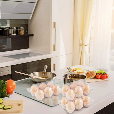 36 Pack Clear Plastic Egg Cartons with Six Egg Capacity Eco Friendly Disposable Egg Holders on kitchen counter next to dishes.
