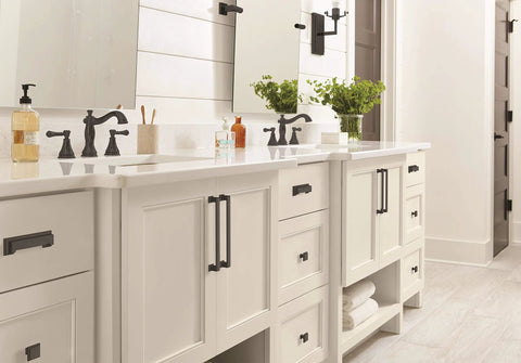 Matte Black Cup Pull Cabinet Hardware on bathroom vanities, showcasing 3 Inch and 3-3/4 Inch center-to-center drawer pulls in use.