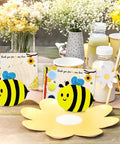 Bee Birthday Party Decor Kit With 24 Wooden Bee Craft Kits To Paint For Party Favors And Bee Themed Gifts Includes Paints Brushes And Thank You Cards Totally Fun For Honey Baby Shower Decorations And Creative Diy Party Activities with thank you cards, paints and flower centerpieces on a table.