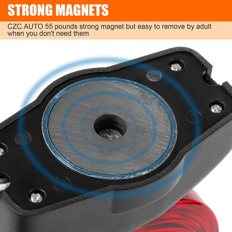 Close-up view of CZC AUTO 12V magnetic trailer light with circular magnet base and red lens