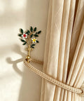 Vintage Flower Wall Hooks, Distressed Metal Coat Rack Set, Ace Farmhouse Entryway Organizer holding curtains with floral design.