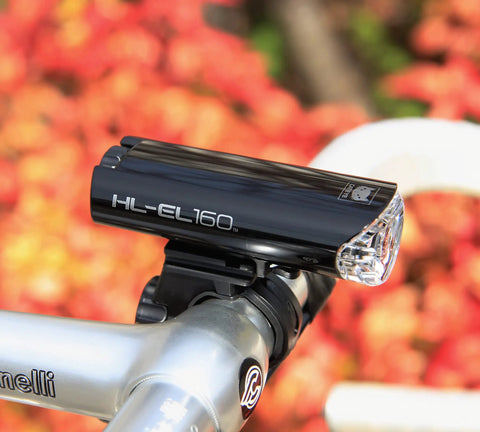 HL EL160 Bike Headlight With IPX7 Waterproof 50 Lumen LED And OptiCube Lens, 30 Hour Constant Run Time, 250 Hour Flashing Mode, Low Battery Indicator, AA Powered, Flextight Mount, Fits Road Urban MTB And Gravel Bikes