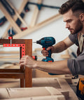 Man using drill with Four Pack 90 Degree Right Angle Clamps With Storage Box, 5.5 Inch Aluminum Alloy Precision Positioning Squares on cabinet.