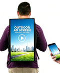 Portable Moving Billboard Backpack For Street Ads And Mobile Promotions Ultra Bright Hella Daylight Visible Lcd Screen Android Powered Gear For Small Business Hustlers, person wearing ad display backpack.