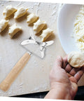 Knock Out Perfect Dumpling Wrappers Effortlessly With This Three Piece Stainless Steel Roller Set Designed For Quick Shaping And Easy Cleanup A Legit Game Changer For Home Chef Essentials Daily with hand holding shaped dough.