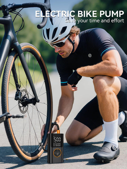 Man using Portable Tire Inflator With Gauge And USB Charging Output, 150 PSI Fast Air Compressor For Cars, Bikes, Motorcycles, Scooters And Balls, Quick Inflate On The Go with bicycle.