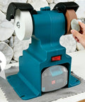 Depisuta Mini Bench Grinder Electric Small Sander For Metal Wood Knife Making Jewelry Buffing Bench Buffer Polisher on desk with a user.