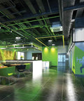 Modern gym interior with bright green accents and visible Ultra Bright LED High Bay Light 21000 To 27000 Lumens Adjustable 4000K Or 5000K UVOLT 120 347V Round Pro Ceiling Fixture For Warehouses Garages And Shops Energy Efficient Long Lasting Built To Last