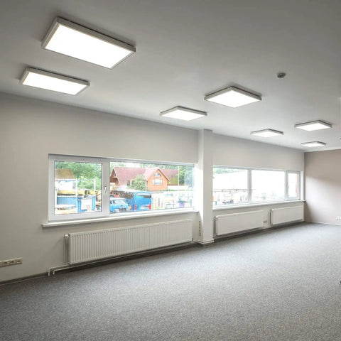 Bright office with installed 6 Pack 2x2 LED Flat Panel Surface Mount Kit Aluminum Drop In Ready Ceiling Frame 24x24 Inches LED Panel Light Not Included Durable 6063 Aluminum Construction For Recessed Or Surface Install.