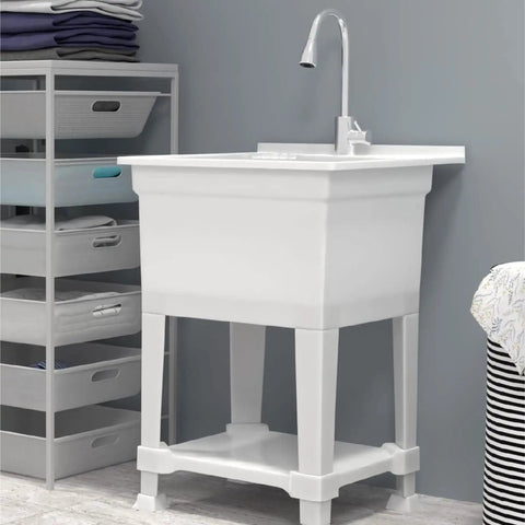 Freestanding Utility Tub Sink With Quick Connect Drain 24x24 white portable compact sink with pullout faucet in a laundry room.
