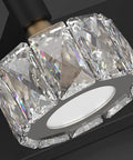 Close-up of K9 crystal orb on Three Light Crystal Bathroom Vanity Light Fixtures Over Mirror Black Modern Dimmable LED Wall Lights.