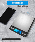 Pocket Digital Kitchen Scale For Jewelry And Cooking, 500g Capacity With 0.01g Precision, Backlit LCD Display next to smartphone.