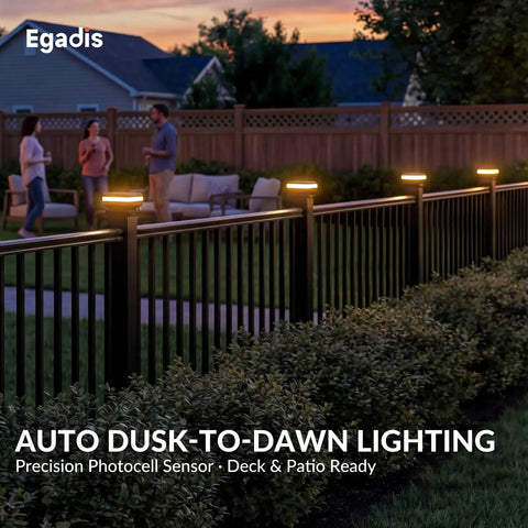 Rock Solid Modular Aluminum Deck Railing Kit With Built In Lighting 36 By 6 Feet Four Pack with solar lights in a backyard setting.